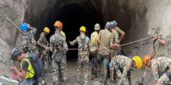 Nepal rescuers blast hillside in search of hydropower workers as families wait anxiously